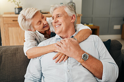 Buy stock photo Elderly, couple and happy hug of woman and man with quality time on a house sofa together. Happiness and smile of senior people embracing with love during retirement on a home living room couch