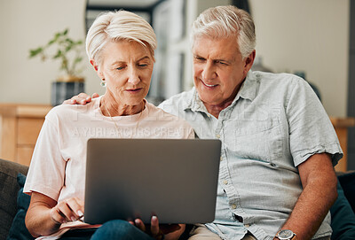 Buy stock photo Senior couple, laptop or bonding on house or home living room sofa in England with movie streaming, video call or internet search. Smile, happy or relax retirement elderly man and woman on technology