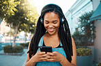 Black woman, music headphones and phone with smile for 5g communication and audio streaming outdoors. Happy African female smiling, listening to playlist, texting and social media in South Africa