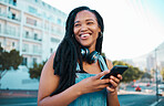 Student, street and happy girl with smartphone enjoying leisure break on weekend in Los Angeles. Black woman hipster with smile on commute with phone and headphones for music streaming in city.
