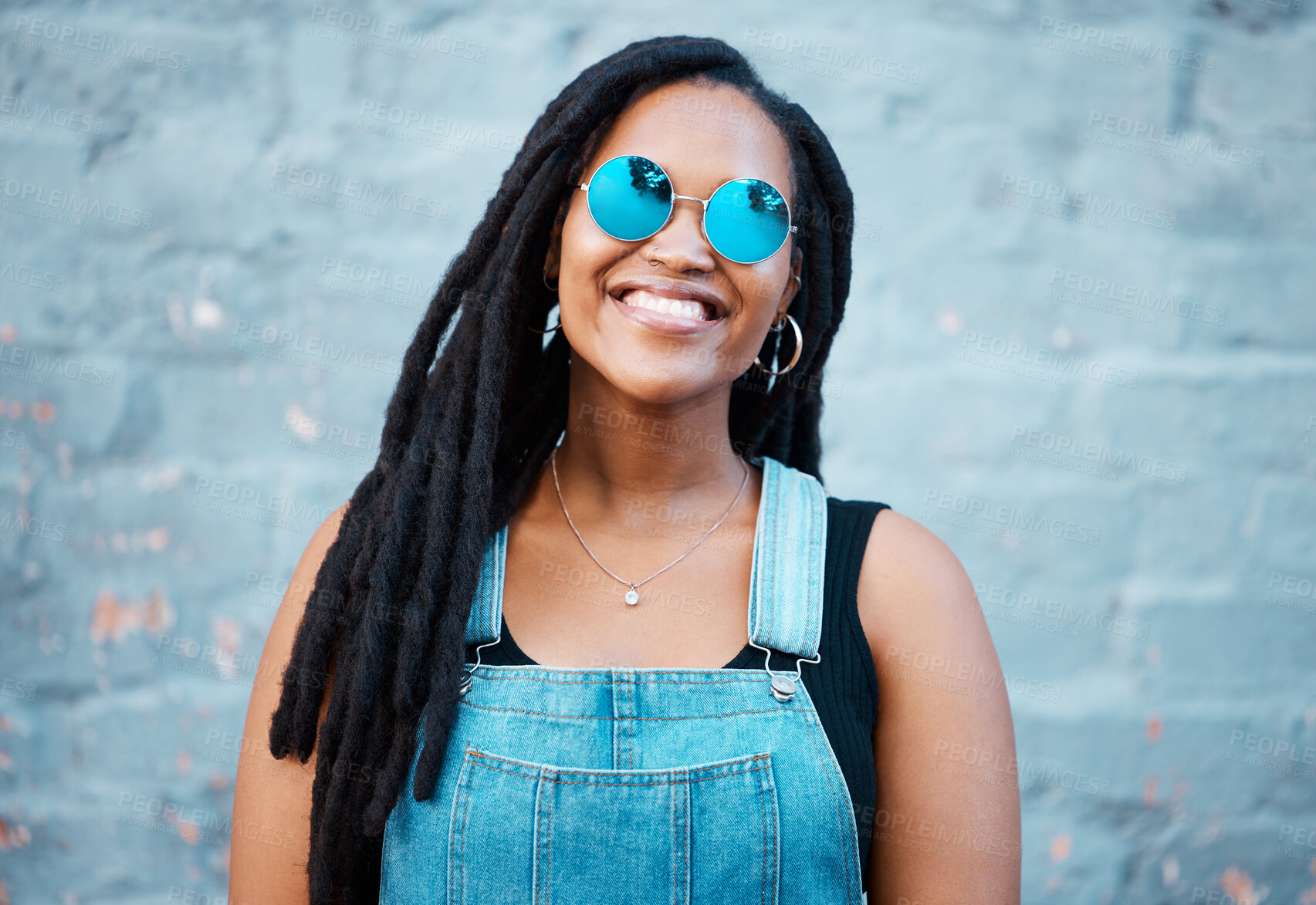 Buy stock photo Portrait of black woman with sunglasses in the city and a smile on her face. Young fashion model, summer and happy girl with glasses, trendy accessories and street clothes smiling in an urban town