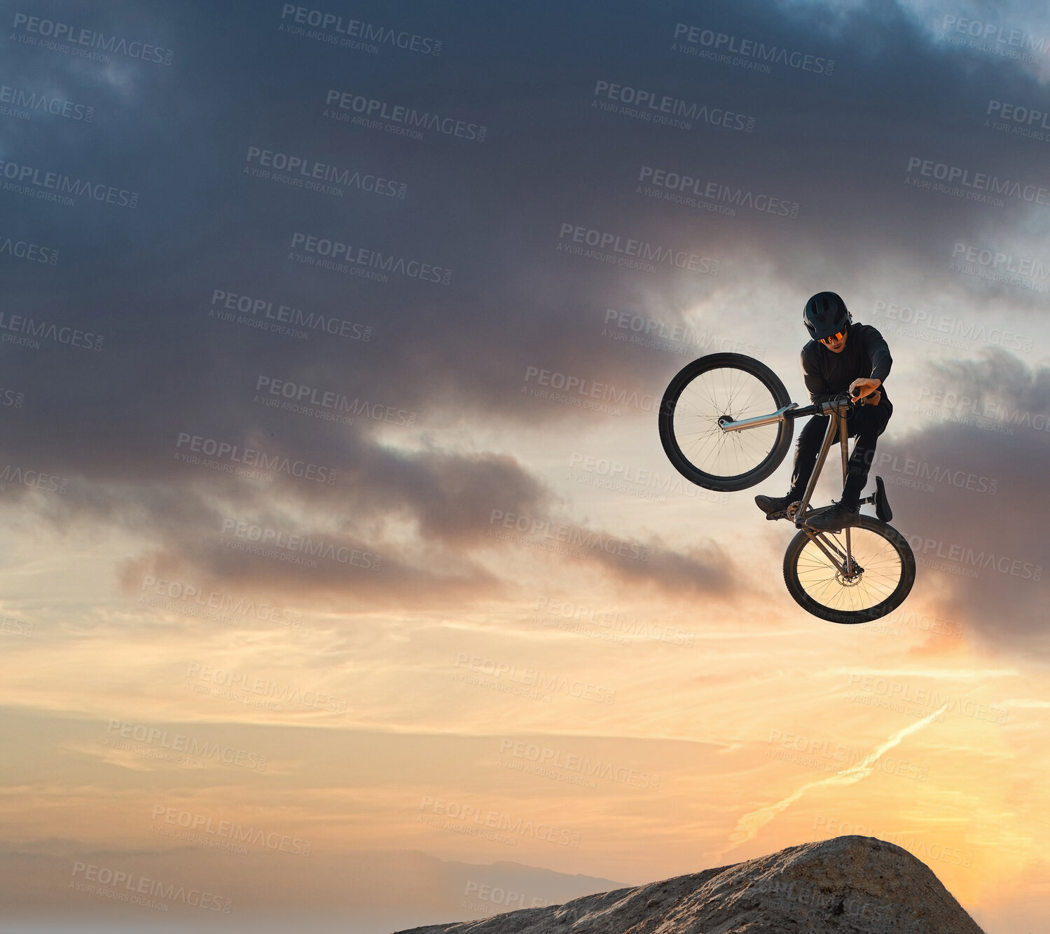 Buy stock photo Mountain bike, jump and sport with mockup of a man athlete with energy and speed in nature. Healthy sports person with speed jumping and cycling with his bicycle at sunset on mountains with mock up