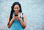 Happy black woman typing on smartphone on social media marketing, advertising or mobile app on blue wall background mockup. Gen z teenager with cellphone networking, online chat or check notification