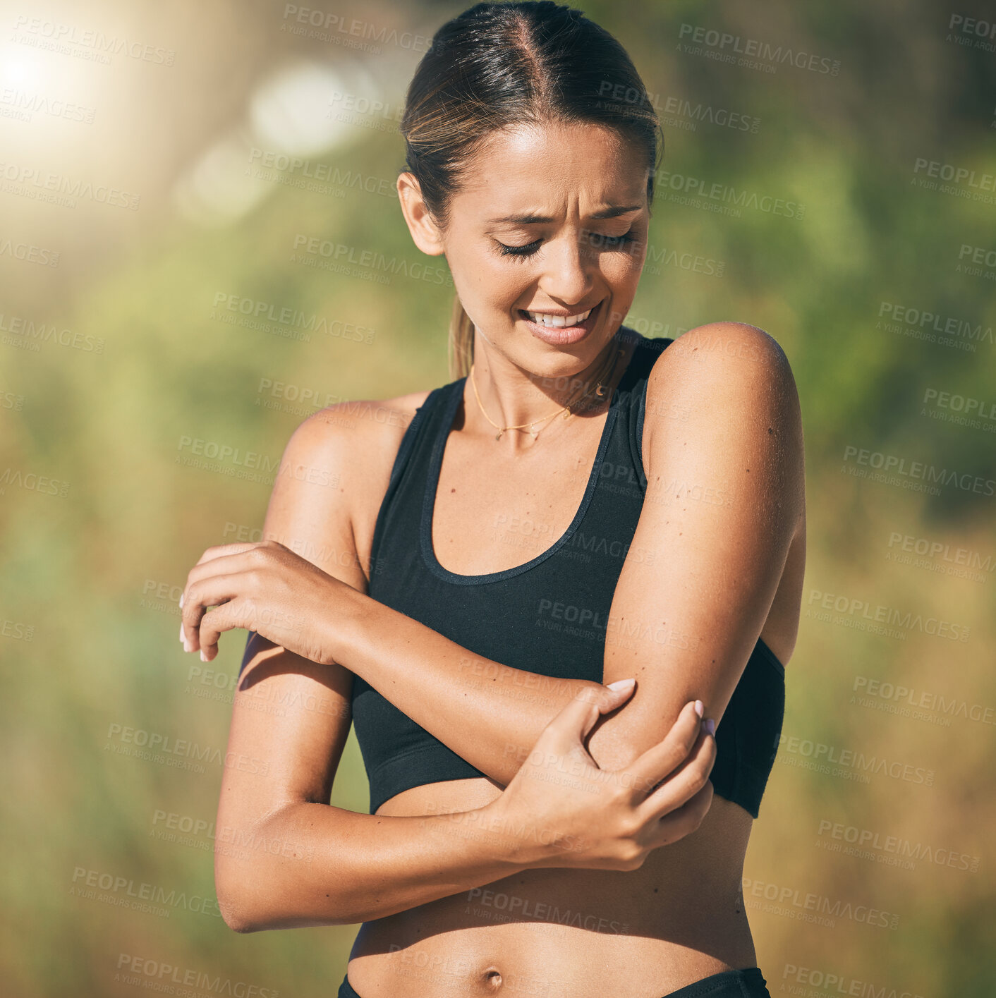 Buy stock photo Fitness, woman and elbow in pain, injury or sports accident of runner suffering in joint ache outdoors. Athletic female holding painful area of muscle, inflammation or broken bone in discomfort