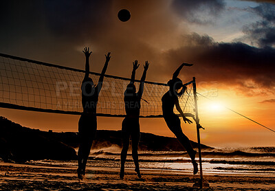 Buy stock photo Sports, beach and volleyball at sunset by women silhouette jumping for ball together, fun, travel and summer. Energy, fitness and exercise with sports friends playing beach volleyball game in Brazil