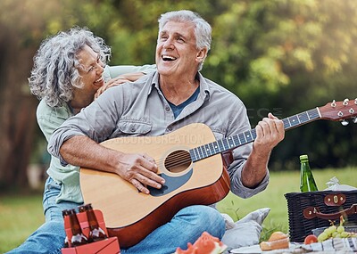 Buy stock photo Elderly, couple and guitar at happy picnic in garden, park or nature together. Man, woman and music for happiness on travel to countryside for lunch, food or relax with love by trees in sunshine