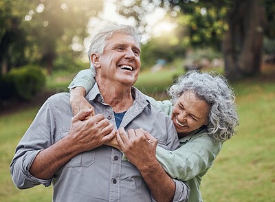 Buy stock photo Senior couple hugging in park, garden and retirement to relax, wellness and fresh air in nature in Australia together. Happy man, funny woman and playful elderly people laughing, enjoy joke and love