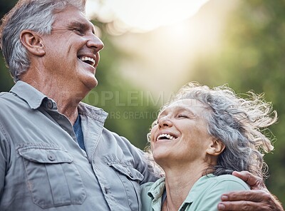 Buy stock photo Elderly, couple and hug with smile in nature romance together to enjoy trees, air and sunshine. Senior man, woman and love in retirement laughing outside, show happiness, care and bonding in fun time