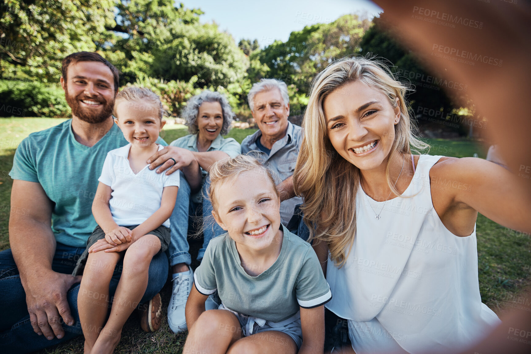 Buy stock photo Family selfie, park portrait and woman with smile on holiday in nature in Canada during summer. Parents, girl kids and grandparents taking photo on vacation in a green garden for picnic in spring