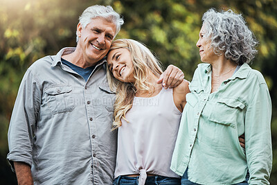 Buy stock photo Nature, senior parents and hug with daughter to bond on weekend in usa for happy family moment. Proud, elderly and retirement people with woman relatives smile together with care and love embrace.