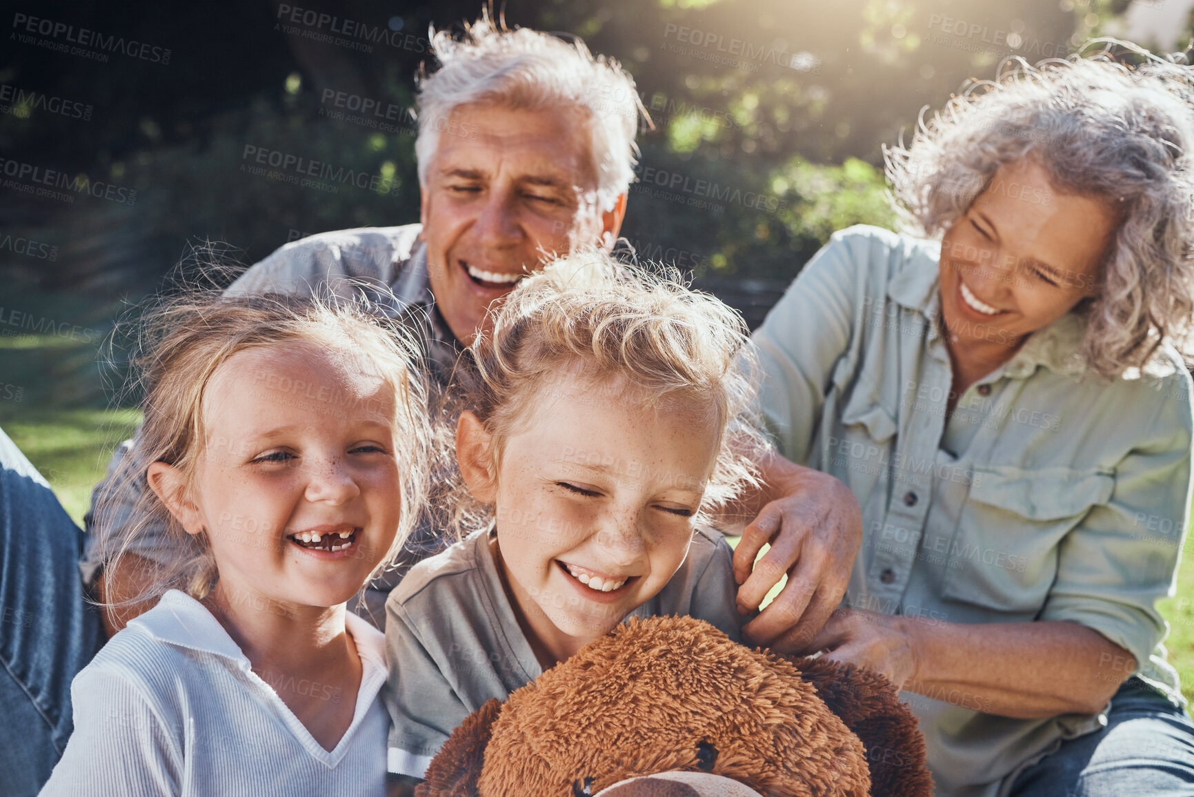 Buy stock photo Family, children and love with a girl, grandparents and sister outdoor in a nature park for fun and adventure. Kids, park and picnic with an elderly male, female and grandchildren laughing outside