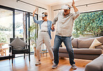 Vr dance, 3d and senior couple with games for creative, futuristic and comic happiness in the living room of the house. Elderly man and woman playing metaverse and digital dancing on technology