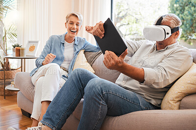 Buy stock photo Virtual reality, 3d and digital gaming senior couple online in living room with futuristic metaverse technology. VR, esports and tech with a man gamer with fun enjoying esports video games on sofa