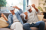 Senior couple on the sofa with tech for virtual reality experience in their home. Retired man and woman using technology, futuristic and vr headset goggles for 3d games and entertainment in metaverse