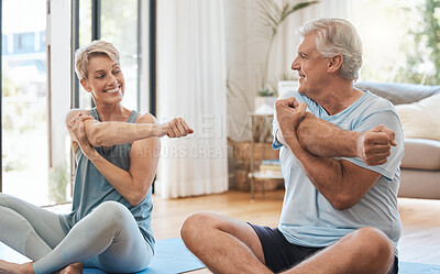 Buy stock photo Stretching, home fitness and senior couple training together on the living room floor in the house. Happy elderly man and woman doing yoga, pilates exercise and cardio for body health in the lounge