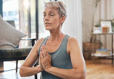 Buy stock photo Senior woman, yoga and meditation at home for exercise, wellness and health during zen practice for peace, balance and mindfulness. Fitness, retirement and fit old lady in prayer position to meditate