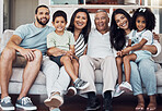 Big family portrait on sofa, home living room together in Mexico and happy afro latino girl sitting on mom lap. Senior grandparents love young children, proud father smile and generations happiness