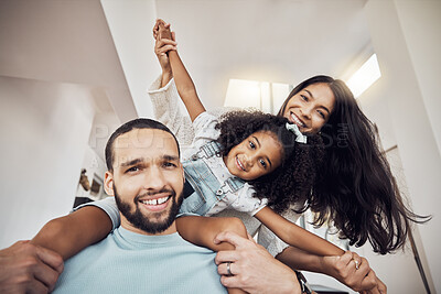 Buy stock photo Relax, happy family and home portrait with child enjoying bonding leisure with Mexican parents. Love of caring mother and dad with excited daughter getting piggyback ride in Mexico house for fun.