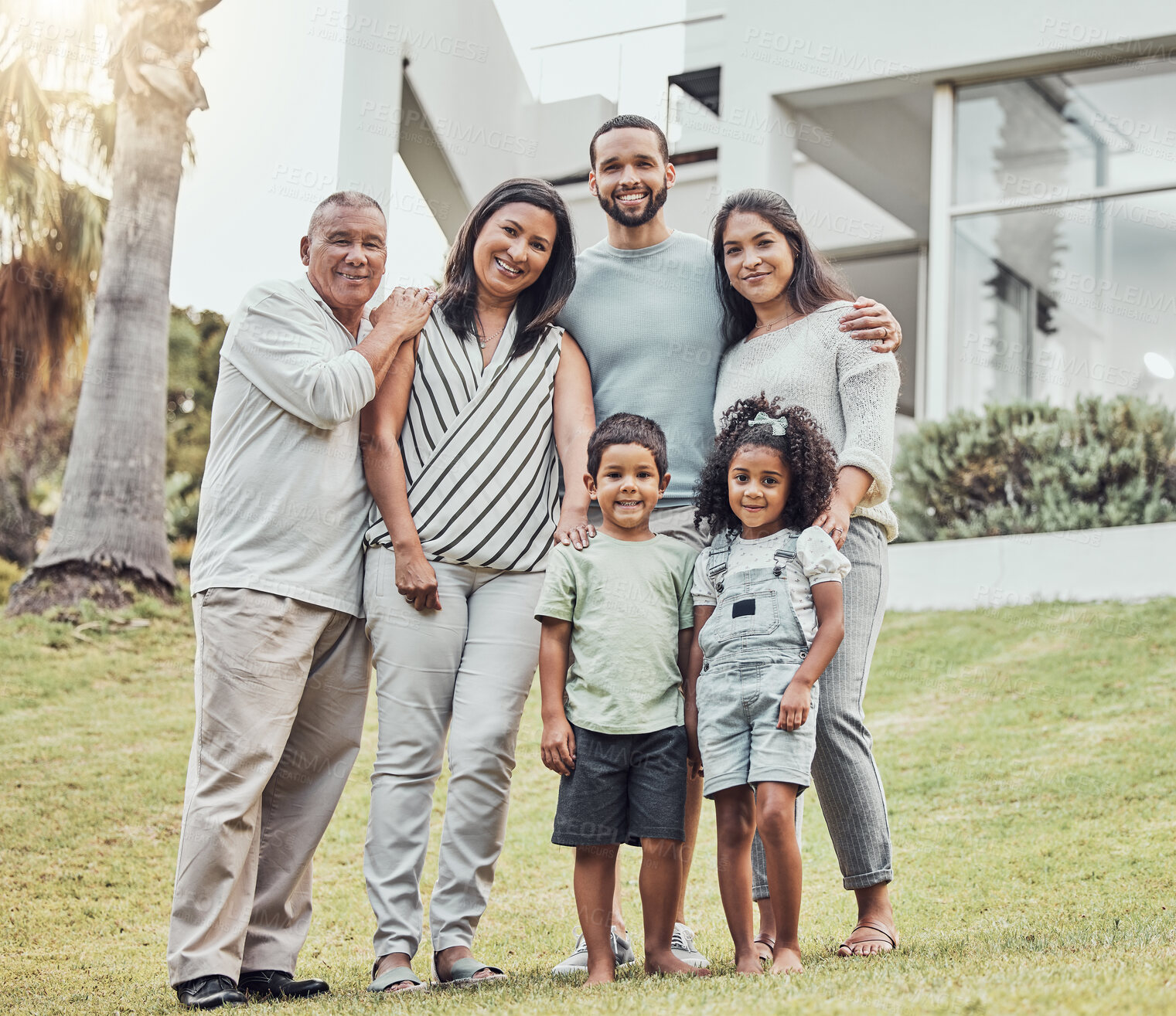 Buy stock photo Big family, parents or children bonding in new house garden after mortgage loan, home finance or real estate investment. Portrait, smile or happy kids with senior grandparents with property insurance