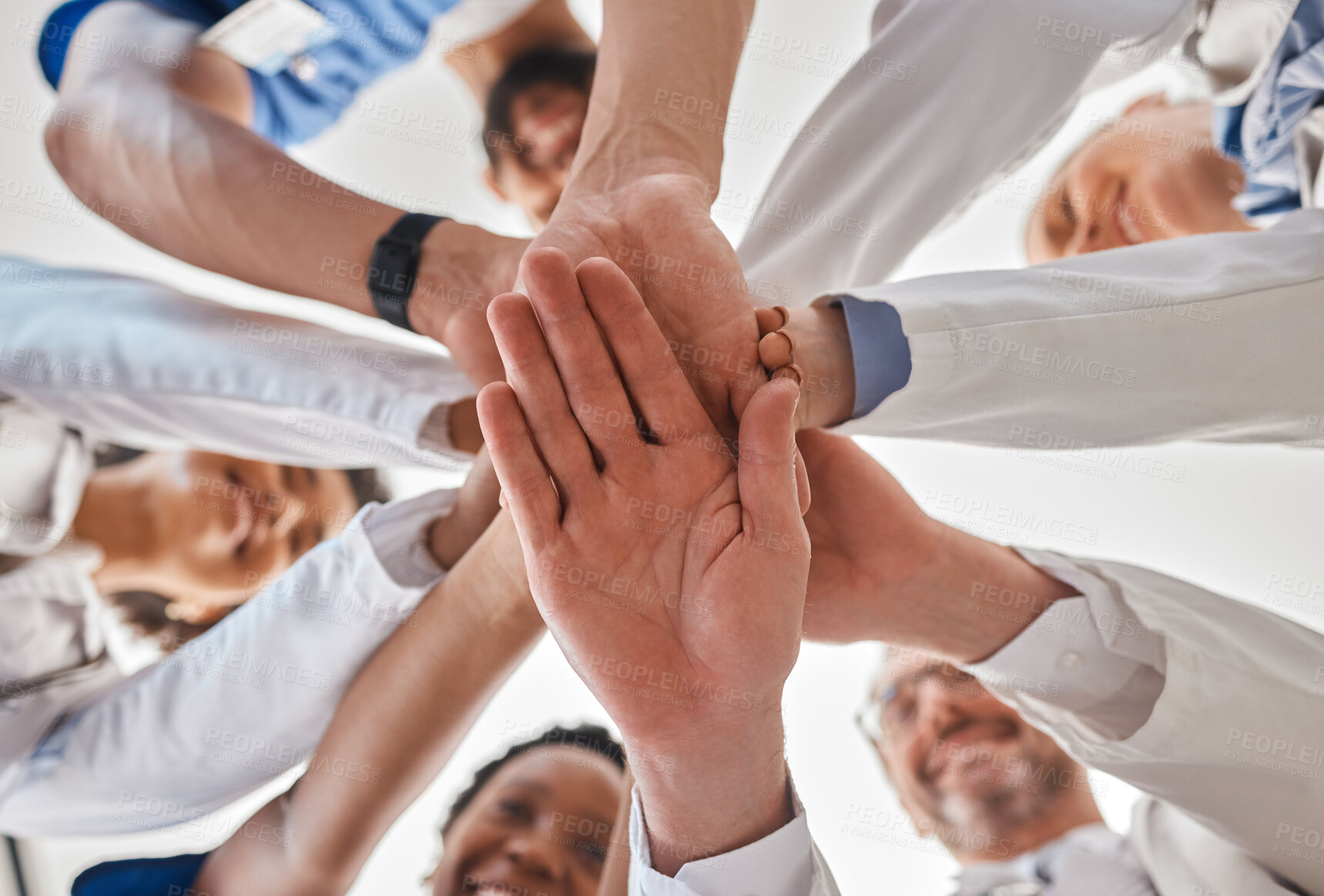 Buy stock photo Hands, doctor and teamwork in hospital for motivation, inspiration and diversity in at work. Medical, team and hand together in collaboration at clinic, to help community in healthcare and wellness