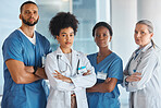 Diversity, teamwork and portrait of medical doctors standing in the hallway of the hospital. Collaboration, medicine and team of multiracial professional healthcare employees at a medicare clinic.