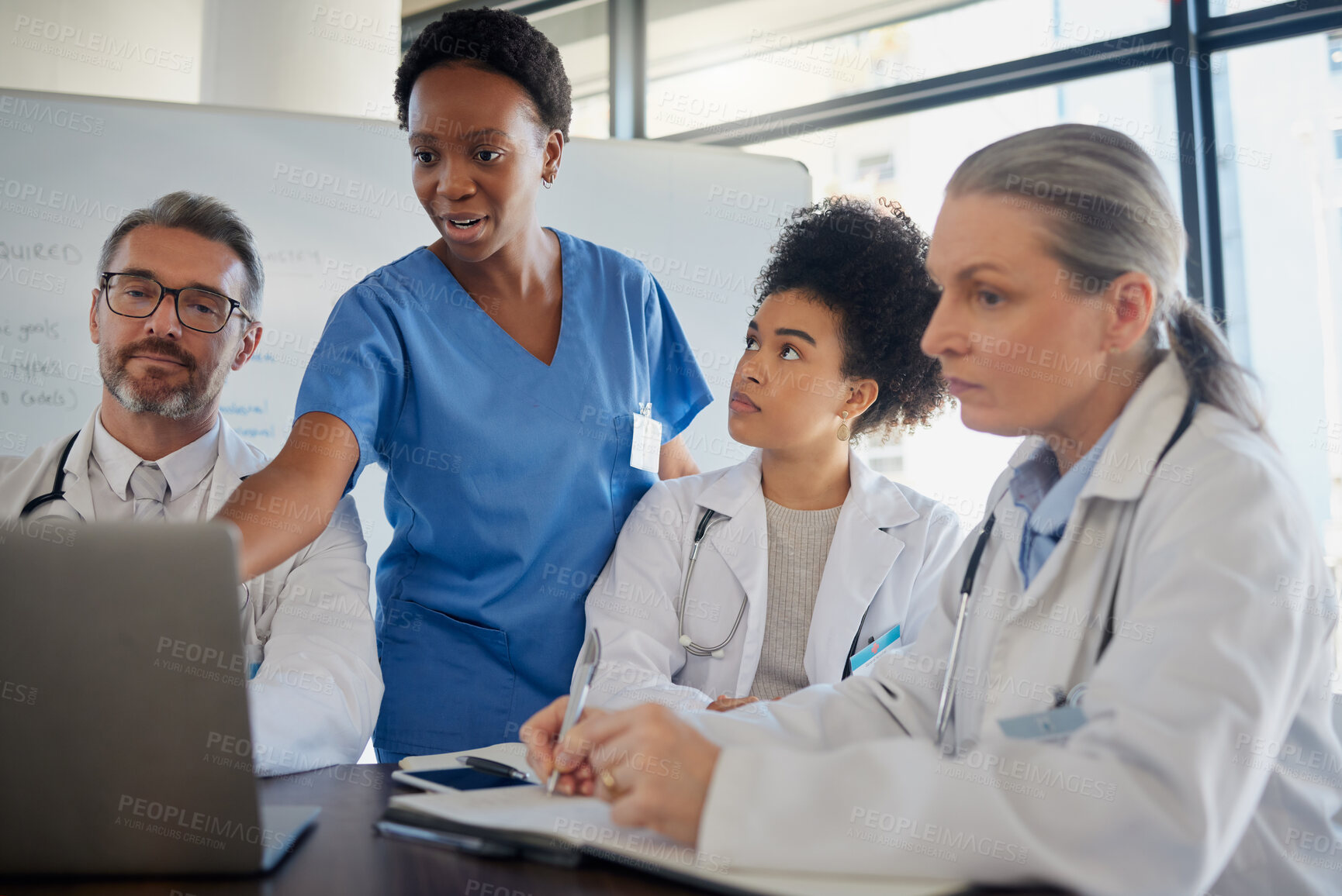 Buy stock photo Teamwork, healthcare and planning with a doctor, nurse and medicine team at work on a laptop during a meeting. Collaboration, research and insurance with a medical group working in the hospital