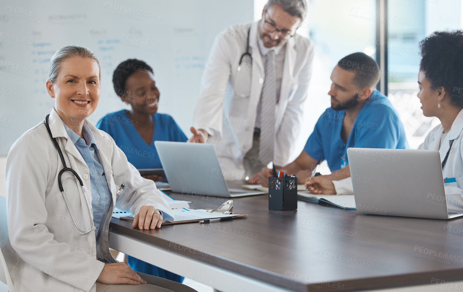 Buy stock photo Healthcare, medicine and teamwork with a woman leader or doctor and team in a meeting for research and strategy. Collaboration, innovation and medical with a hospital group at work in the boardroom