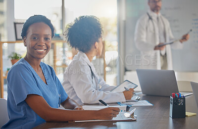 Buy stock photo Medical meeting, portrait and African doctor writing notes in a nursing workshop for training at a hospital. Happy, professional and black woman nurse in a seminar for medicine at a clinic at work