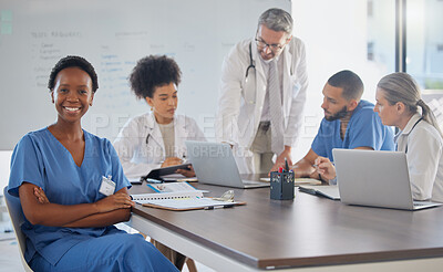 Buy stock photo Medical meeting, portrait and African doctor working in seminar with employees at a hospital. Proud, happy and black woman nurse with arms crossed and support for healthcare during workshop at clinic