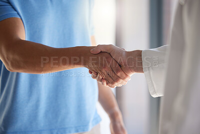 Buy stock photo Handshake, trust and respect with a patient and medical worker or doctor shaking hands, greeting or introduction during consultation. Closeup of men with thank you gesture or welcome, agree or greet