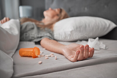 Buy stock photo Depression, mental health and overdose with pills and woman in bedroom for anxiety, suicide and death. Sad, medicine and grief with girl lying in bed after taking drugs for pain, trauma and problem