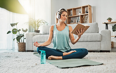 Buy stock photo Meditation yoga, calm music and woman reading a book while listening to podcast on the living room floor of a house. Girl training her mind with a book for knowledge, relax and peace in the lounge