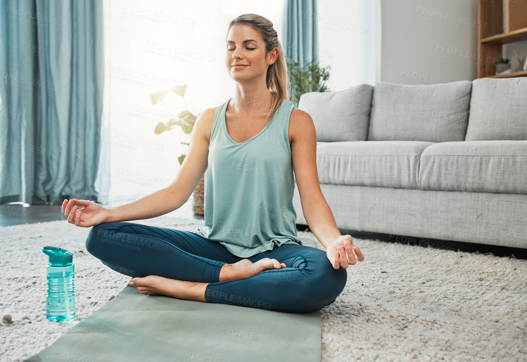 Buy stock photo Yoga, pilates and zen woman in meditation for mind and body relaxation with peace, wellness and balance at home. Mindfulness, fitness and spiritual girl training in a lotus pose in the living room 