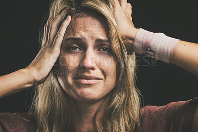 Buy stock photo Suicide, depression and sad with a woman victim of violence in studio on a dark background. Anxiety, mental health and pain with a female thinking of death while suffering from pain, hurt or anger