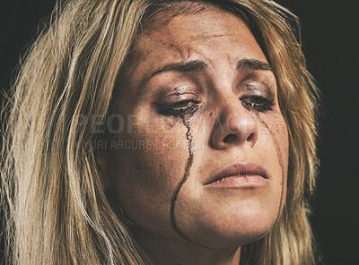 Buy stock photo Sad, depression and woman crying with makeup smudge on face from tears with studio wall closeup. Depressed, hopeless and unhappy girl with mental health problem in distress with messy mascara.