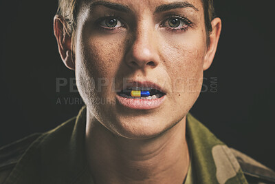 Buy stock photo Medicine, medical drugs and military woman with tablet in mouth for ptsd, depression or anxiety against black studio background. Portrait of a soldier with pills for stress and mental health