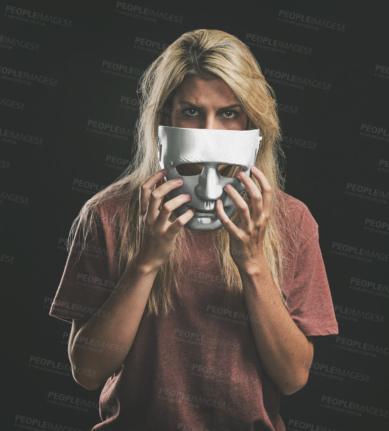 Buy stock photo Sad portrait and woman with bipolar mask to hide depression struggle with mockup in studio. Depressed girl hiding identity, emotions and mental health disorder with theatre face disguise.

