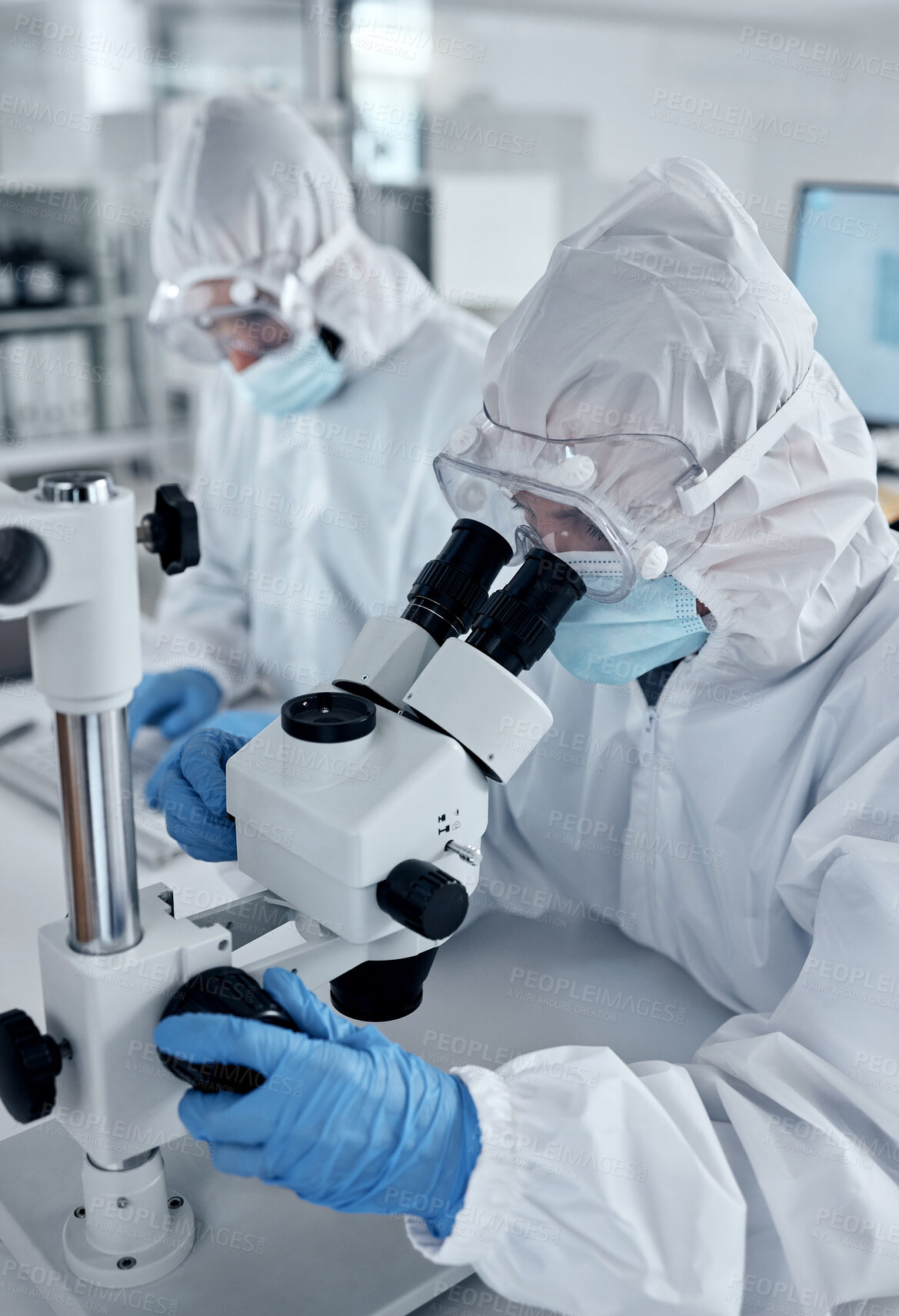 Buy stock photo Research, covid hazmat or dengue scientist work in a medical staff lab in a hospital or clinic. Science, microscope and working laboratory workers with technology for disease analysis and innovation