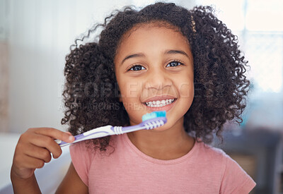 Buy stock photo Young girl kids, portrait and brushing teeth, dental healthcare and bathroom toothbrush in Brazil home. Happy, smile and black child face cleaning mouth, healthy wellness development and fresh breath
