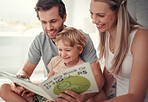 Parents, child and reading dinosaur books in family home for educational fun, learning and happy development in Australia. Mom, dad and kid playing, learning and laughing funny animal story together