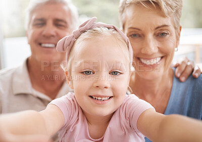 Buy stock photo Girl, grandparents and family selfie portrait in home having fun spending quality time together. Love, support and grandma, grandpa and kid taking a picture, bonding and smile, laughing and joy.


