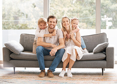 Buy stock photo Happy, family smile and relax on living room sofa for holiday break together at home. Portrait of white couple and kids relaxing, smiling and enjoying time in happiness sitting on couch in the lounge