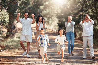 Buy stock photo Nature, running and happy family cheering on children in a park having fun on summer holiday vacation in New York. Mother, father and grandparents supporting kids in a playful  race for exercise