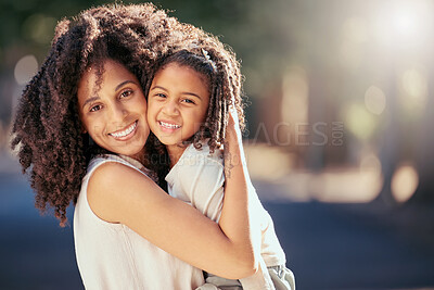 Buy stock photo Black mother with girl child hug in a park with summer lens flare for love, care or growth development outdoor wellness. Happy natural mom bonding with kid in nature portrait together for mothers day