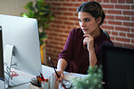 Business woman using computer in office brainstorming female entrepreneur thinking of creative ideas planning strategy looking pensive witing in notebook
