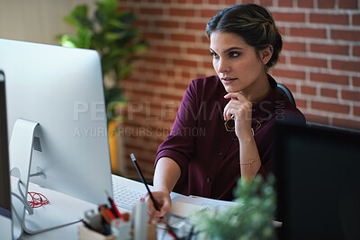 Buy stock photo Business woman using computer in office brainstorming female entrepreneur thinking of creative ideas planning strategy looking pensive witing in notebook
