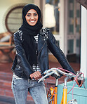 Portrait muslim woman with bicycle smiling happy female tourist travelling in city wearing hijab headscarf