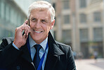 Mature businessman using smartphone talking on mobile phone call having conversation in city 