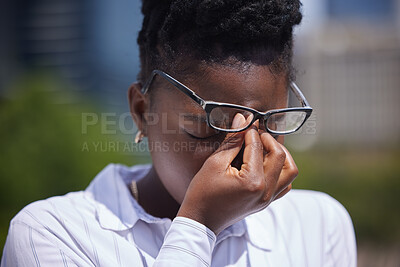 Buy stock photo Headache, stress or mental health and a frustrated or sad black woman with depression outside. Anxiety, pain or anger and a female struggling with burnout, compliance or making a mistake outdoors