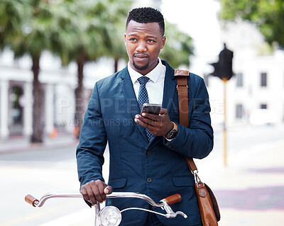 Buy stock photo Phone, business and bike with a business man on his morning commute into work in the city. Businessman on the internet with 5g mobile technology on bicycle travel to decrease his carbon footprint